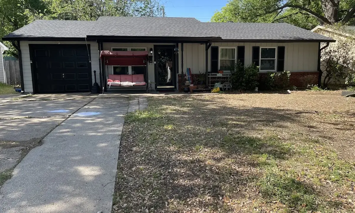 Asphalt Shingle Roof Repair crew at work on a residential roof in Anderson